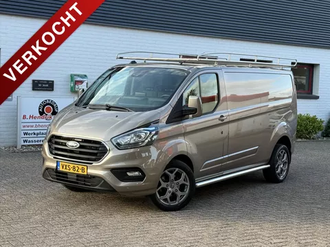 Ford Transit Custom GB 2.0 TDCi 170PK 320 L2H1 Limited/ 18 Inch/ RVS Imperiaal/ Sidebars/ Vloer + wand platen/ Stoelverwarming/ Trekhaak/ Apple Carplay/ Zeer nette bus