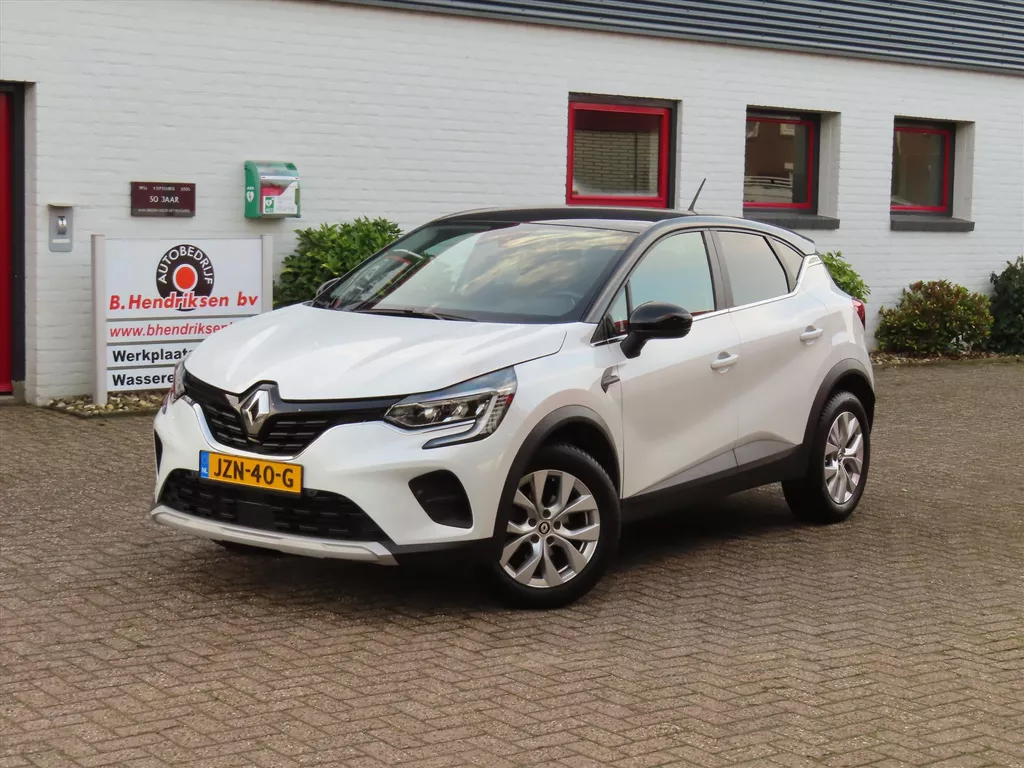 Renault Captur TCe 140pk Mild Hybrid EDC Intens/ Parelmoer wit/ Trekhaak/ Stoel + stuurwiel verwarming/ Camera/ Apple Carplay/ DAB/ Cruise control/ Climatronic