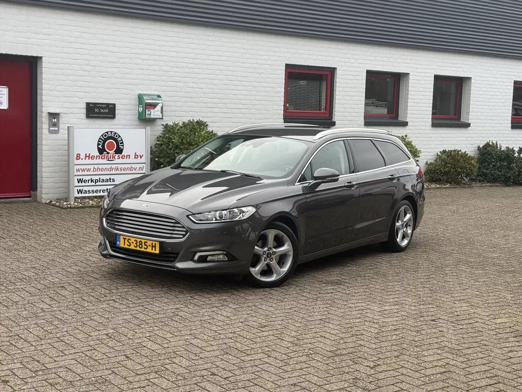 Ford Mondeo Wagon 1.5 EcoBoost 160pk Titanium/ Trekhaak afneembaar/ All season banden/ Camera achter/ Stuur + stoel verwarming/ Keyless entry/ DAB/ Navigatie