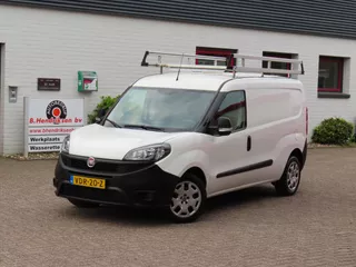 Fiat Doblo Cargo GB 1.6 MJ 105pk L2H1 Maxi/ Imperiaal/ Camera achter/ Trekhaak/ Navigatie/ 3 Zitplaatsen/ Airco/ Cruise control/ 1 Eigenaar/ Origineel NL/ NAP